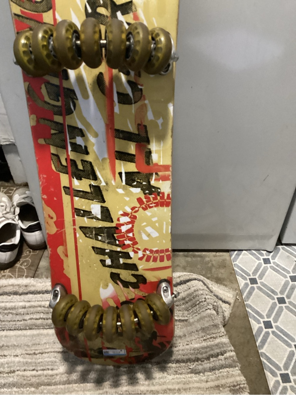 Yellow and Red Graphic Skateboard Wall Art